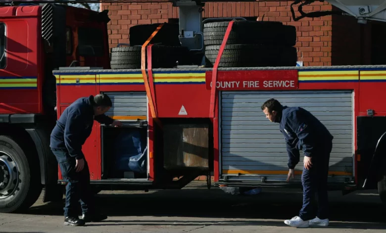 Exterior of a Greater Manchester fire station on a cloudy day