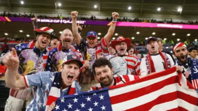 Crowded stadium stands filled with football fans during a World Cup match