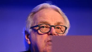 Former Ofcom chairman Lord Michael Grade speaking in a television studio interview.