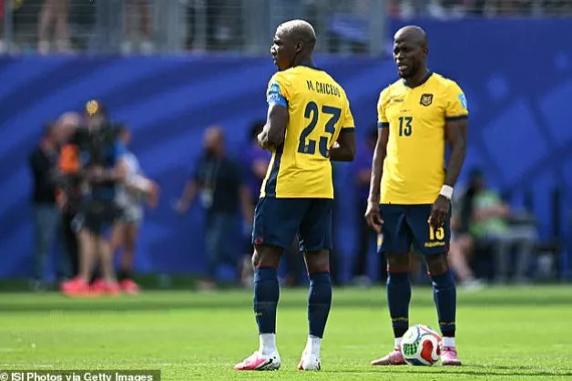 Ecuador captain Moises Caicedo leading teammates in huddle during World Cup group match