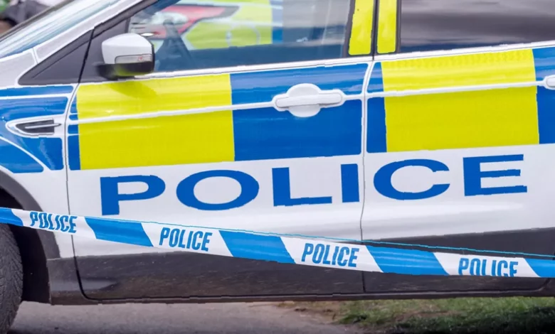Police cordon tape sealing off a residential street in the Westow Hill area of Crystal Palace