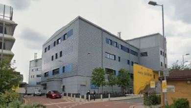 Exterior of Salford Royal Hospital in Greater Manchester under regulatory scrutiny
