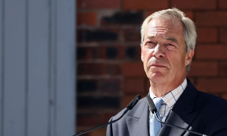 Nigel Farage speaking to journalists outside a parliamentary building in London