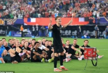 Norway players performing the Viking Row celebration on the pitch after a World Cup match