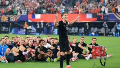 Norway players performing the Viking Row celebration on the pitch after a World Cup match