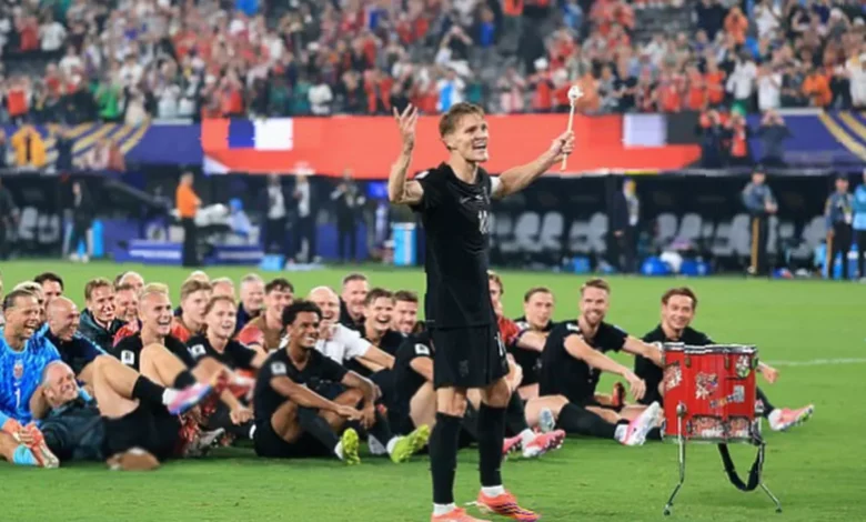 Norway players performing the Viking Row celebration on the pitch after a World Cup match