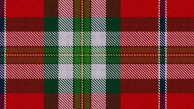 Registered tartan in muted greens and ochres inspired by the Bayeux Tapestry's colours