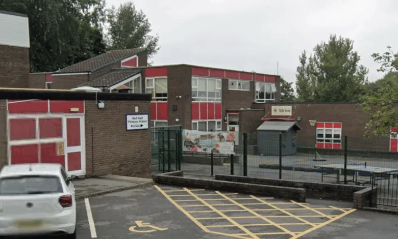 A damaged fence with a gap at the perimeter of a primary school in Darlington
