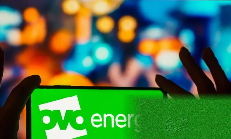 An Ovo Energy smart meter and prepayment key on a kitchen counter