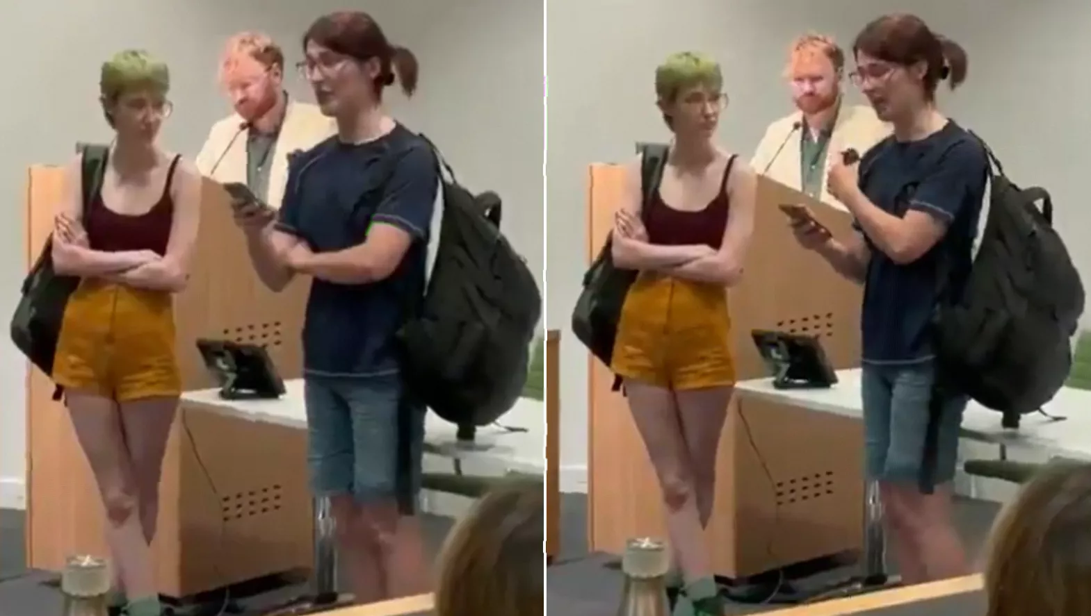 Audience members shouting during a disrupted academic event in the HB Allen Lecture Theatre