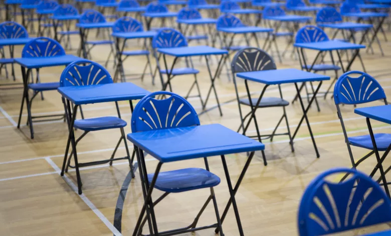 Students leaving an exam hall after a difficult A-level maths test