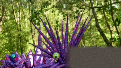 Purple puppet with tubular nose moves through bracken in Ashdown Forest