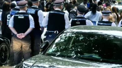 A large crowd of teenagers gathered on Old Kent Road outside a party venue