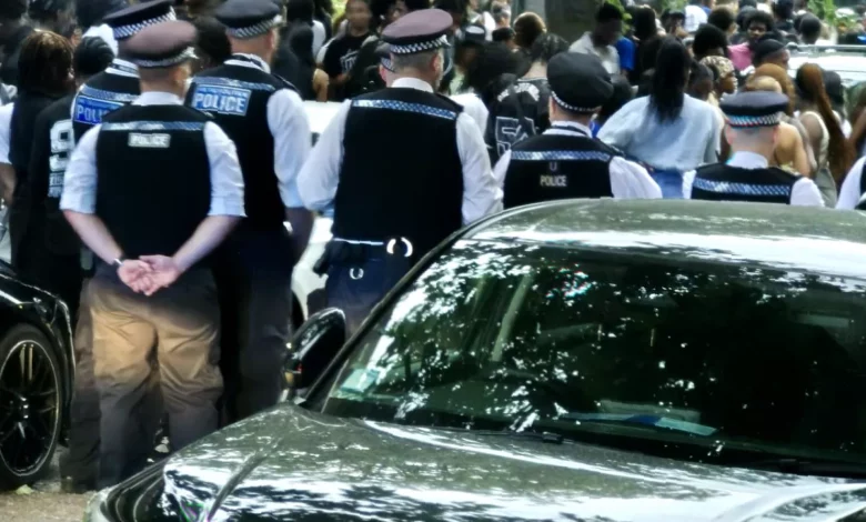 A large crowd of teenagers gathered on Old Kent Road outside a party venue