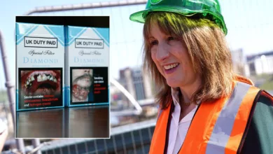 Packets of counterfeit cigarettes displayed on a market stall