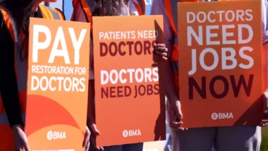 Hospital corridor with closed clinic notices removed after strike suspension