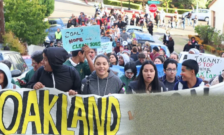Protesters gather outside the Port of Oakland terminal site