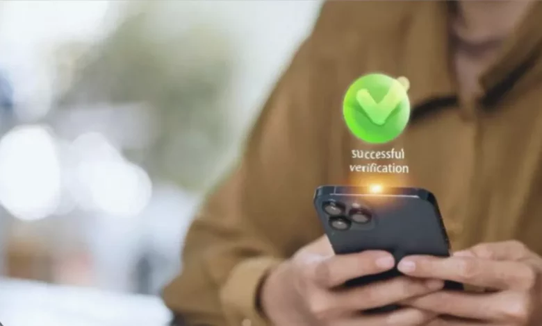 A person using a smartphone to place a bet on a gaming app with a digital wallet interface.