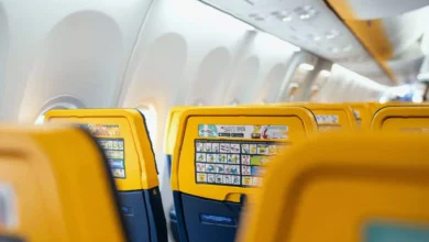 Exterior of a Ryanair aircraft parked at an airport gate