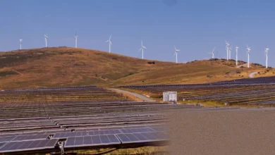 Wind turbines and solar panels in a Spanish landscape generating renewable electricity
