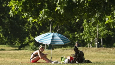 Dark storm clouds gathering over London skyline as temperatures drop sharply