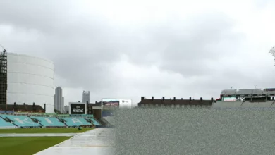 Cricket pitch at the Oval with rain covers being removed during a County Championship match