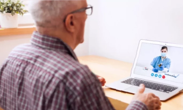 Pharmacist conducting a remote video consultation with a patient in a home setting