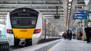 Engineers installing axle counters on tracks between London Blackfriars and Farringdon