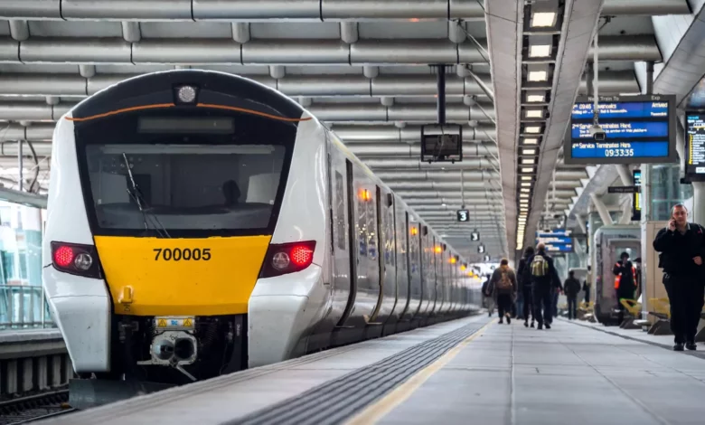 Engineers installing axle counters on tracks between London Blackfriars and Farringdon