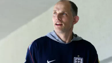 An England manager stands on the touchline during a World Cup qualifying match