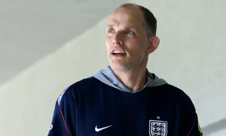 An England manager stands on the touchline during a World Cup qualifying match