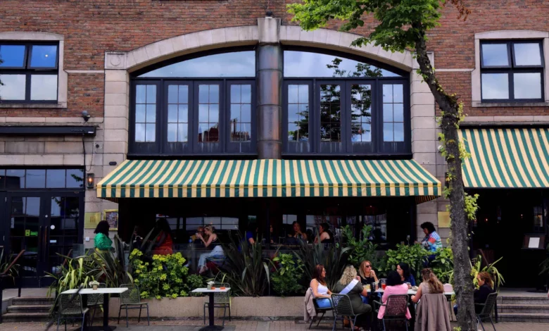 A busy restaurant interior in Northern Ireland with diners eating.