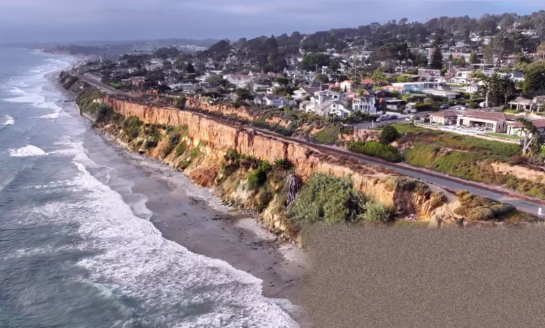 A view of the California coastline near Santa Barbara with offshore oil platforms visible.