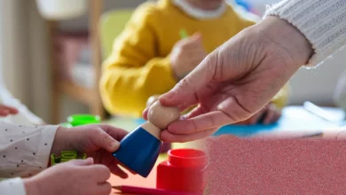 A child receiving an MMR vaccination jab at a GP practice in England