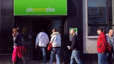 A closed job centre in a British town with a "No Vacancies" sign in the window