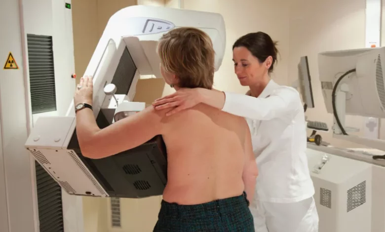 NHS mammogram screening machine in a hospital examination room