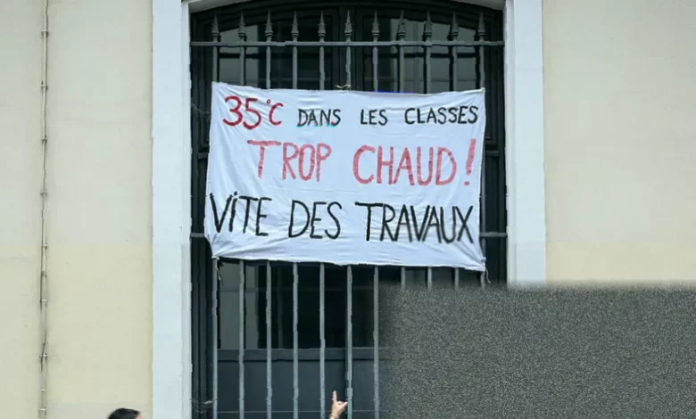 Empty classroom with thermometers showing over 40 degrees Celsius during French heatwave