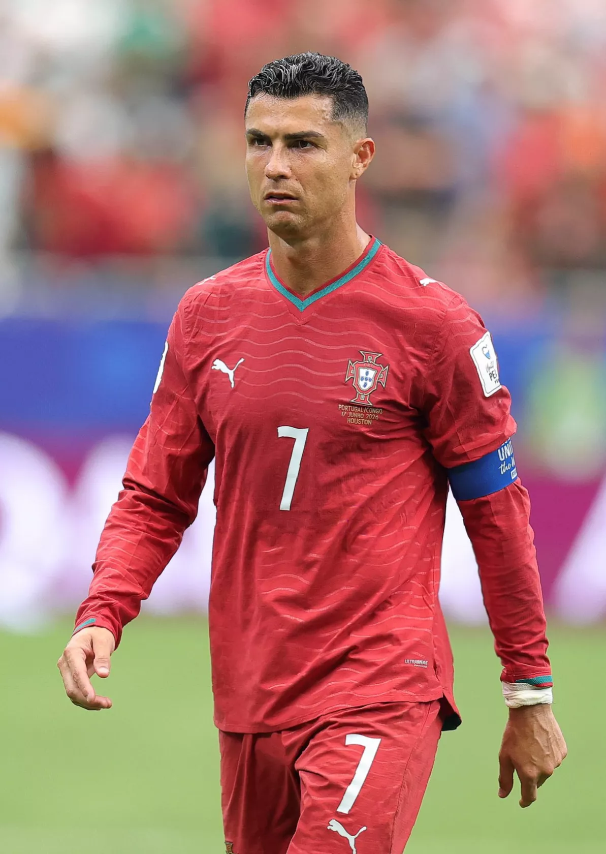 Portugal players warming up on the pitch before a crucial Group K fixture