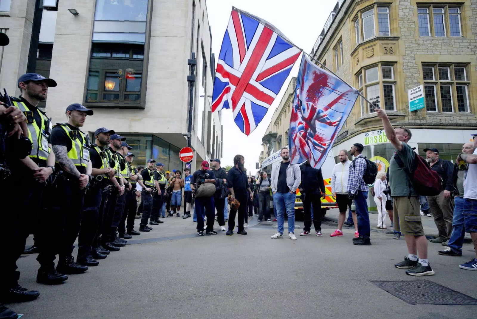 Oxford Union building surrounded by police and demonstrators on Wednesday evening