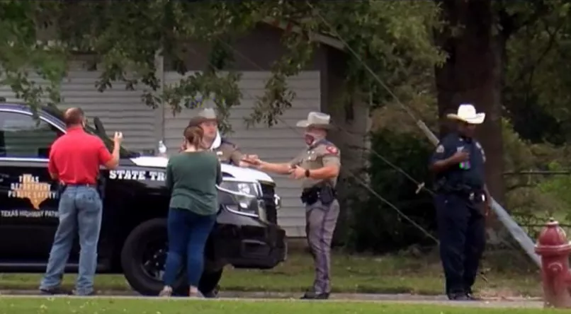 The exterior of a suburban home in New Boston, scene of a fatal attack on a pregnant woman.