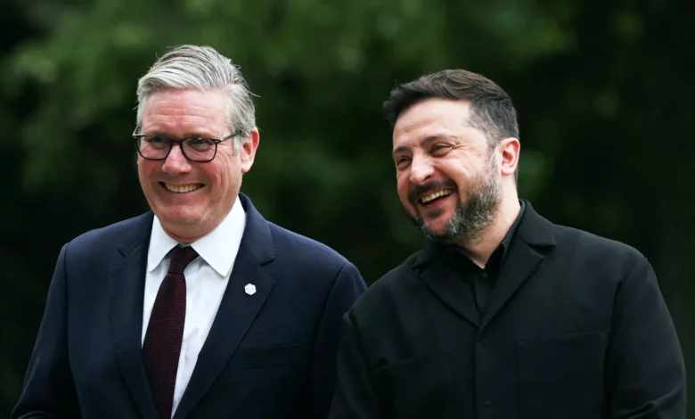 Ukrainian president and British prime minister embracing outside a government building