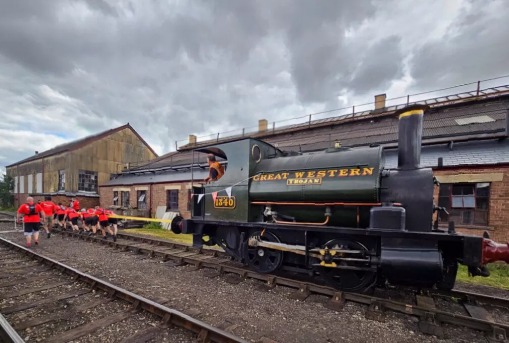 Historic 1897 saddle tank locomotive No. 1340 Trojan on display at a preserved railway depot