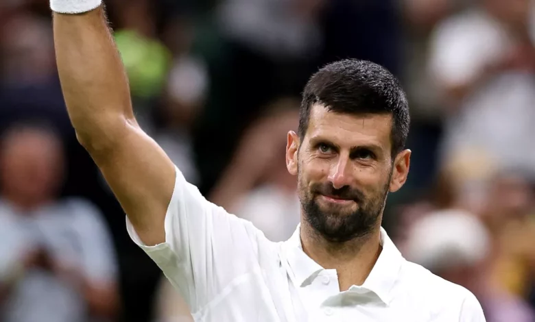 Novak Djokovic serving on Centre Court at Wimbledon during a third-round match.