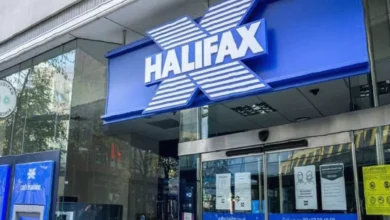 Halifax high street branch with signage being removed in a UK town centre