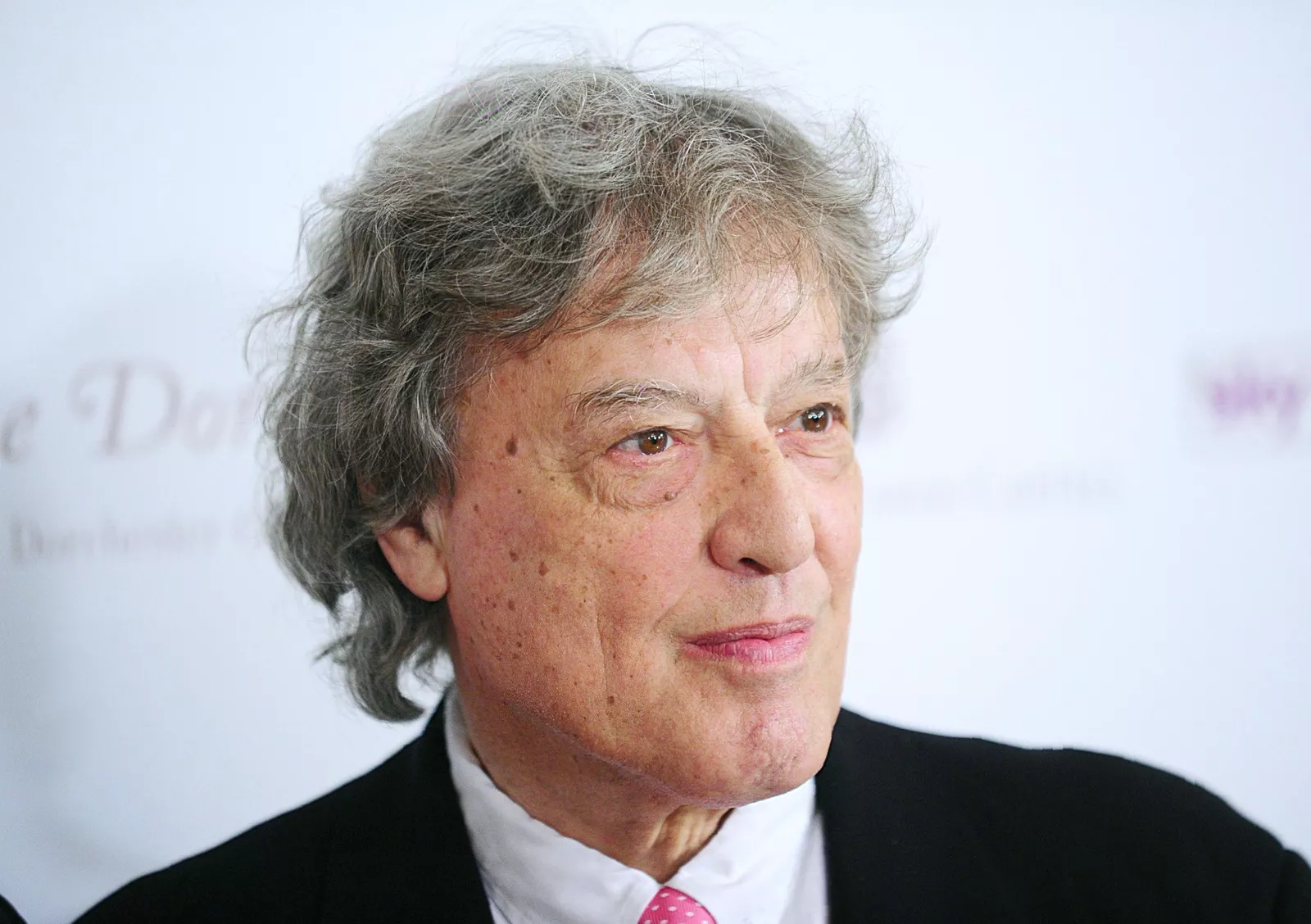 Westminster street with evening crowds near Soho entertainment district