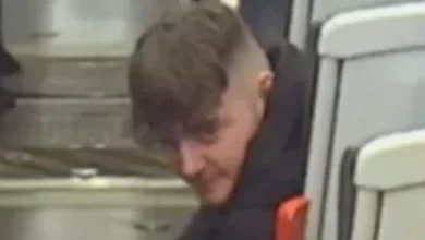 CCTV image released by British Transport Police showing a man wanted for questioning