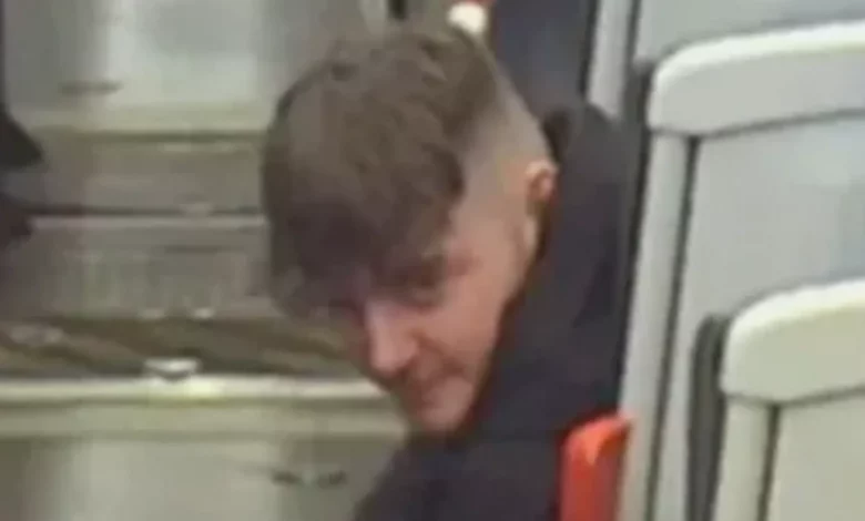 CCTV image released by British Transport Police showing a man wanted for questioning
