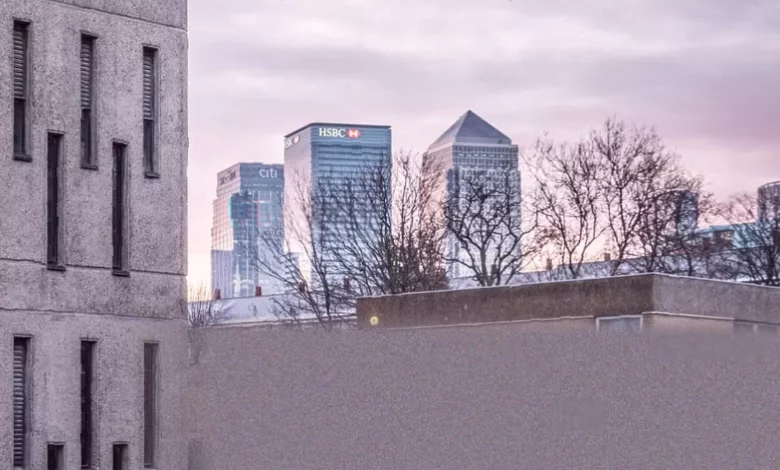 Crowded London street with residential buildings and commuters during rush hour